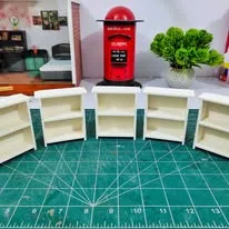 A row of shelves waiting for books