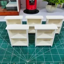 Shelves before paint, on the cutting mat