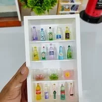 A shelf of tiny bottles